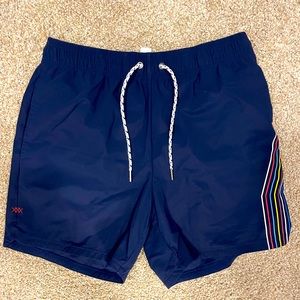 Rhône swim trunks.